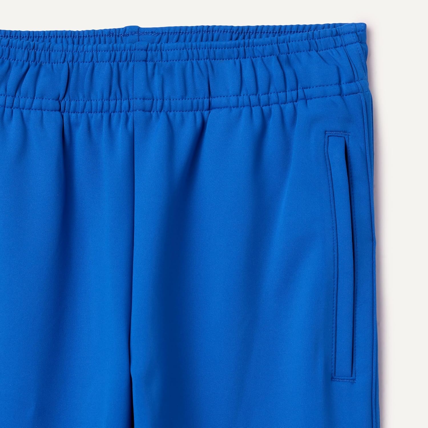image:imageAmazon Essentials Boys Athletic Performance Stretch Knit Jogger Track PantsBlue