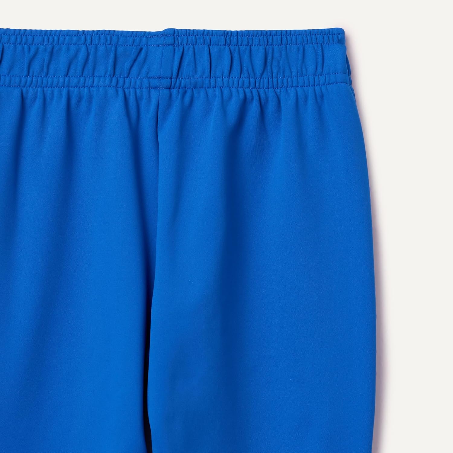 image:imageAmazon Essentials Boys Athletic Performance Stretch Knit Jogger Track PantsBlue