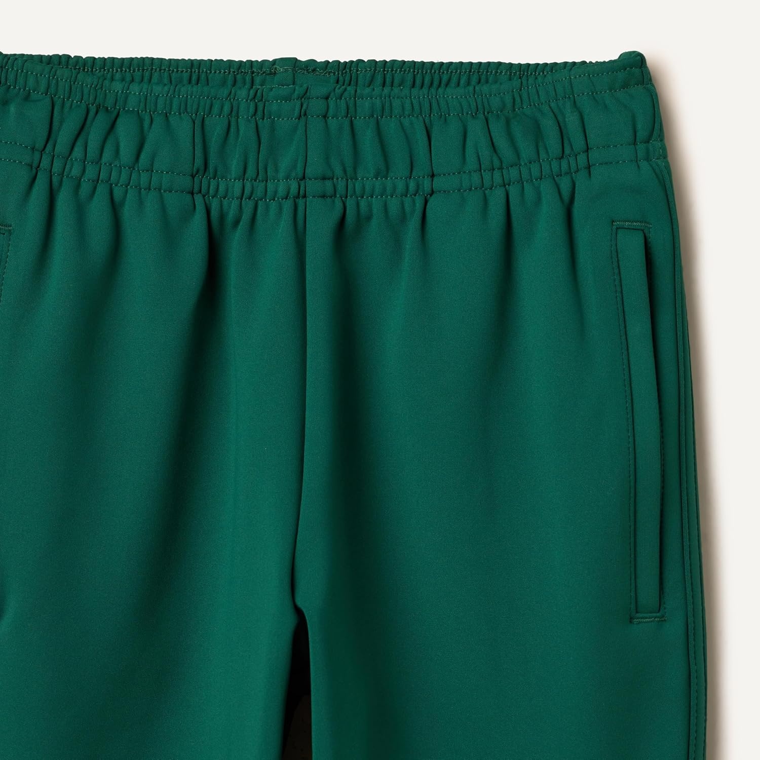 image:imageAmazon Essentials Boys Athletic Performance Stretch Knit Jogger Track PantsDark Green
