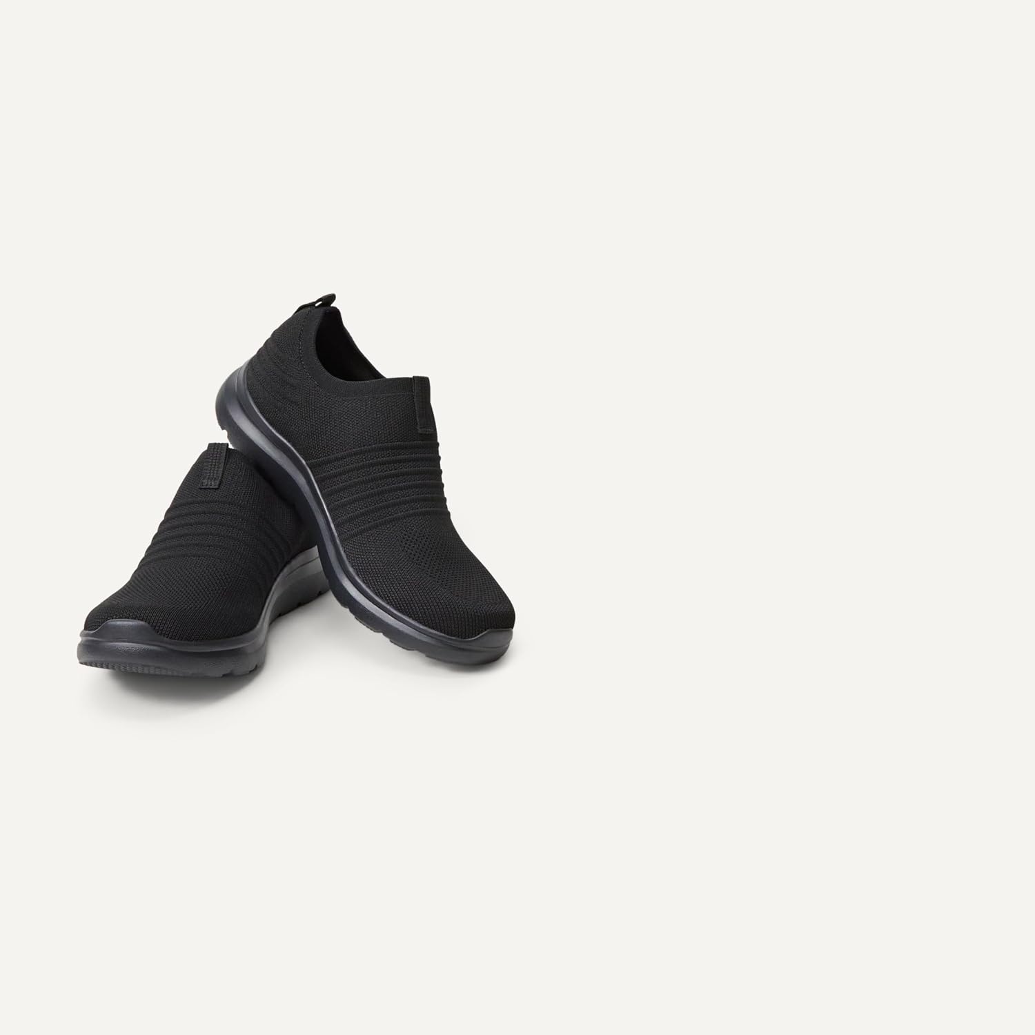 image:imageAmazon Essentials Unisex Kids Knit Light Weight Slip On SneakerBlack