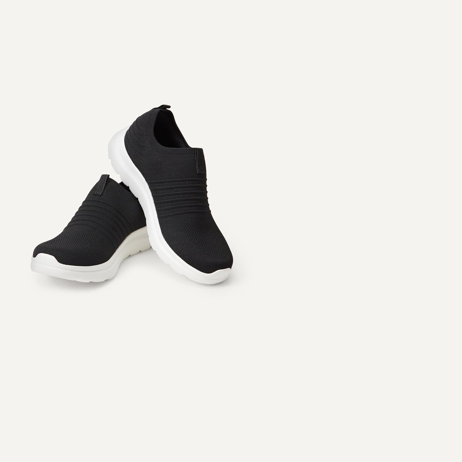 image:imageAmazon Essentials Unisex Kids Knit Light Weight Slip On SneakerBlackWhite