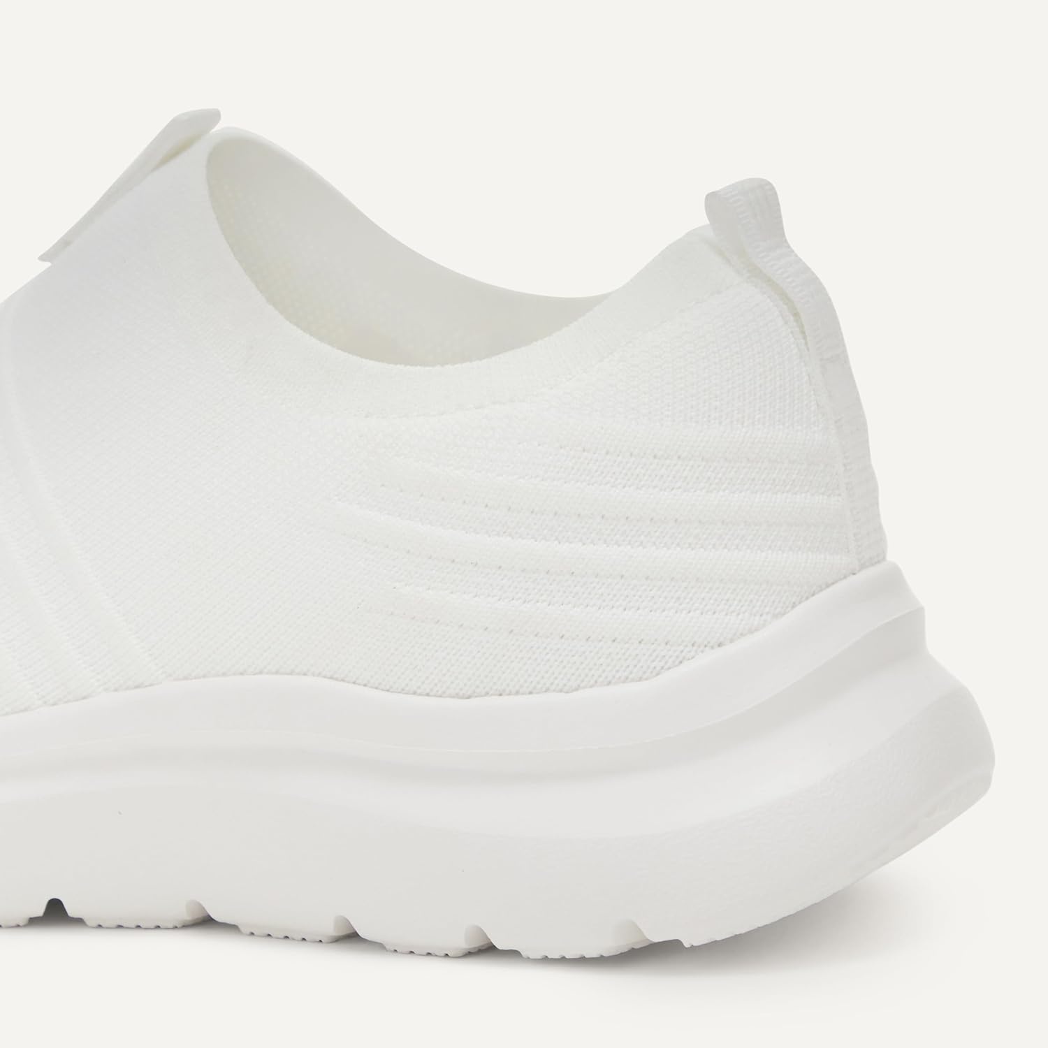 image:imageAmazon Essentials Unisex Kids Knit Light Weight Slip On SneakerWhite