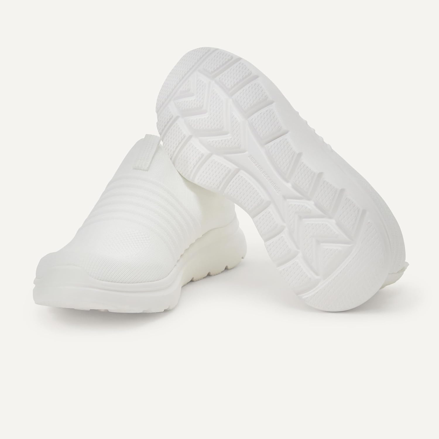 image:imageAmazon Essentials Unisex Kids Knit Light Weight Slip On SneakerWhite