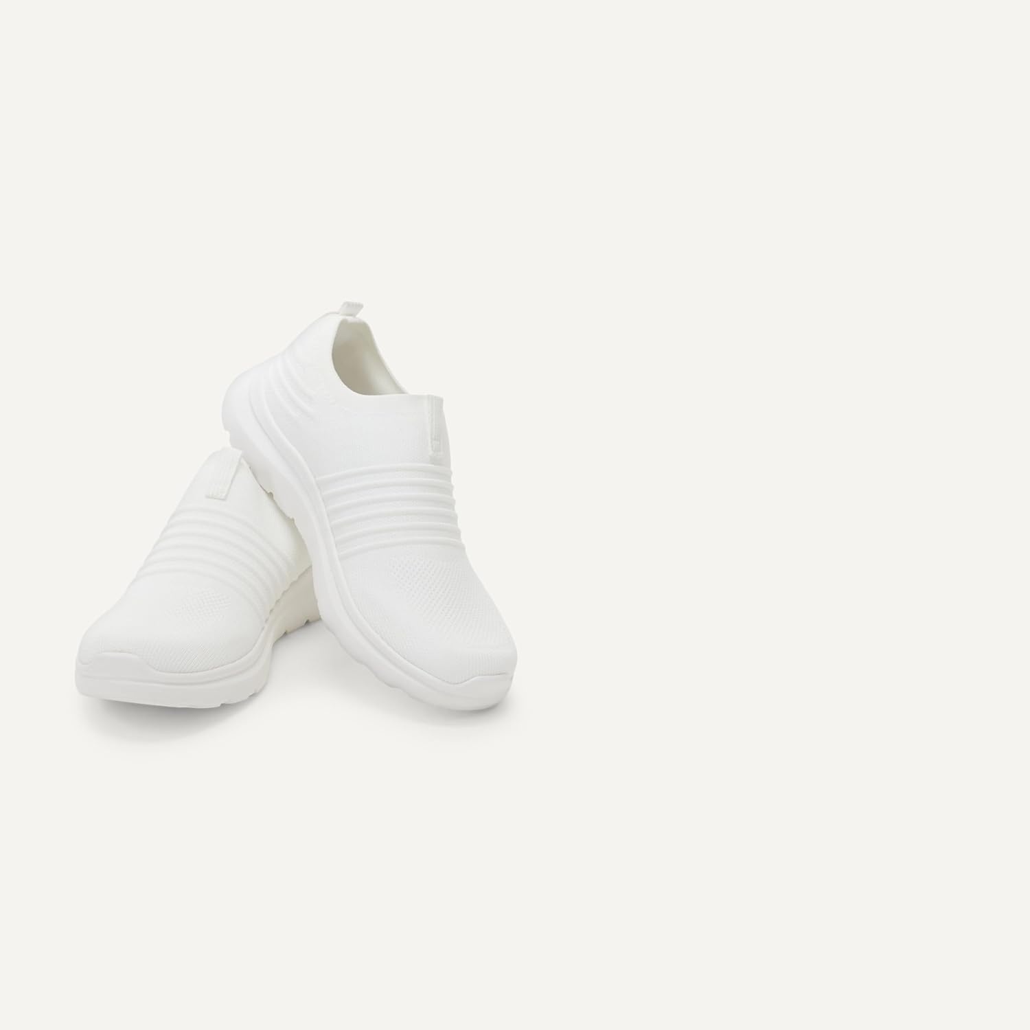 image:imageAmazon Essentials Unisex Kids Knit Light Weight Slip On SneakerWhite