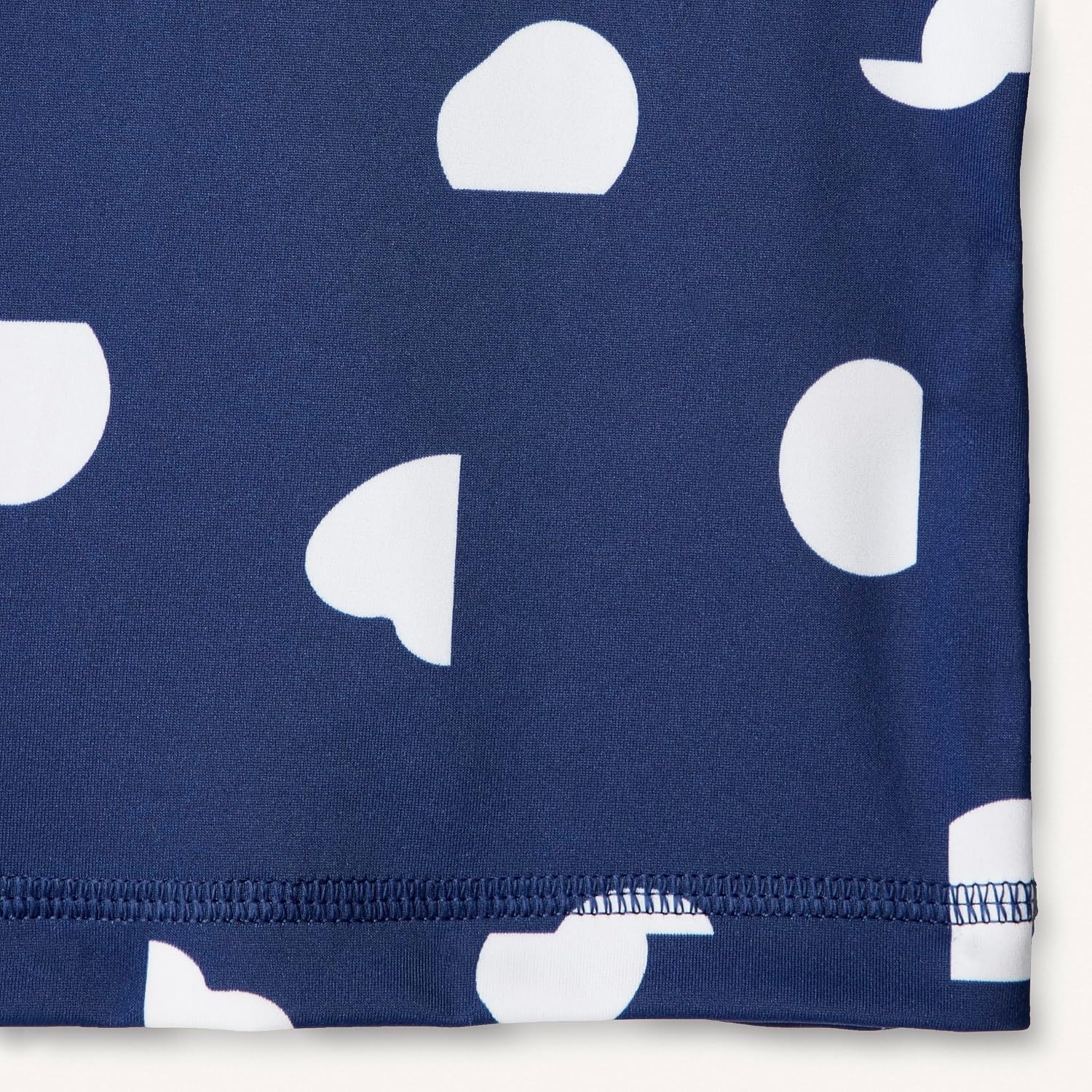 image:imageAmazon Essentials Girls and Toddlers Short Sleeve Slim Fit HighNeck Rashguard TShirtDeep Blue Ivory Abstract Dots