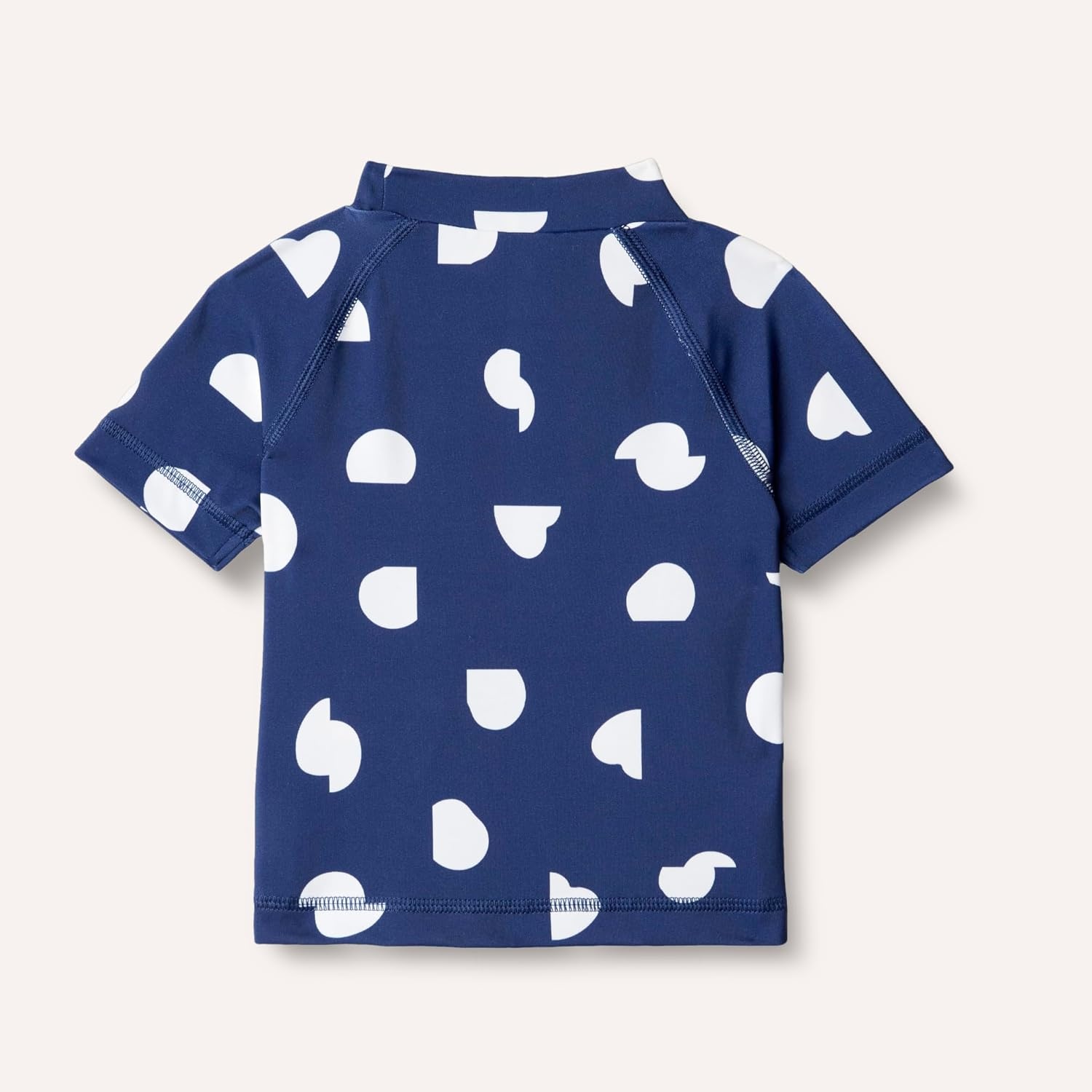 image:imageAmazon Essentials Girls and Toddlers Short Sleeve Slim Fit HighNeck Rashguard TShirtDeep Blue Ivory Abstract Dots
