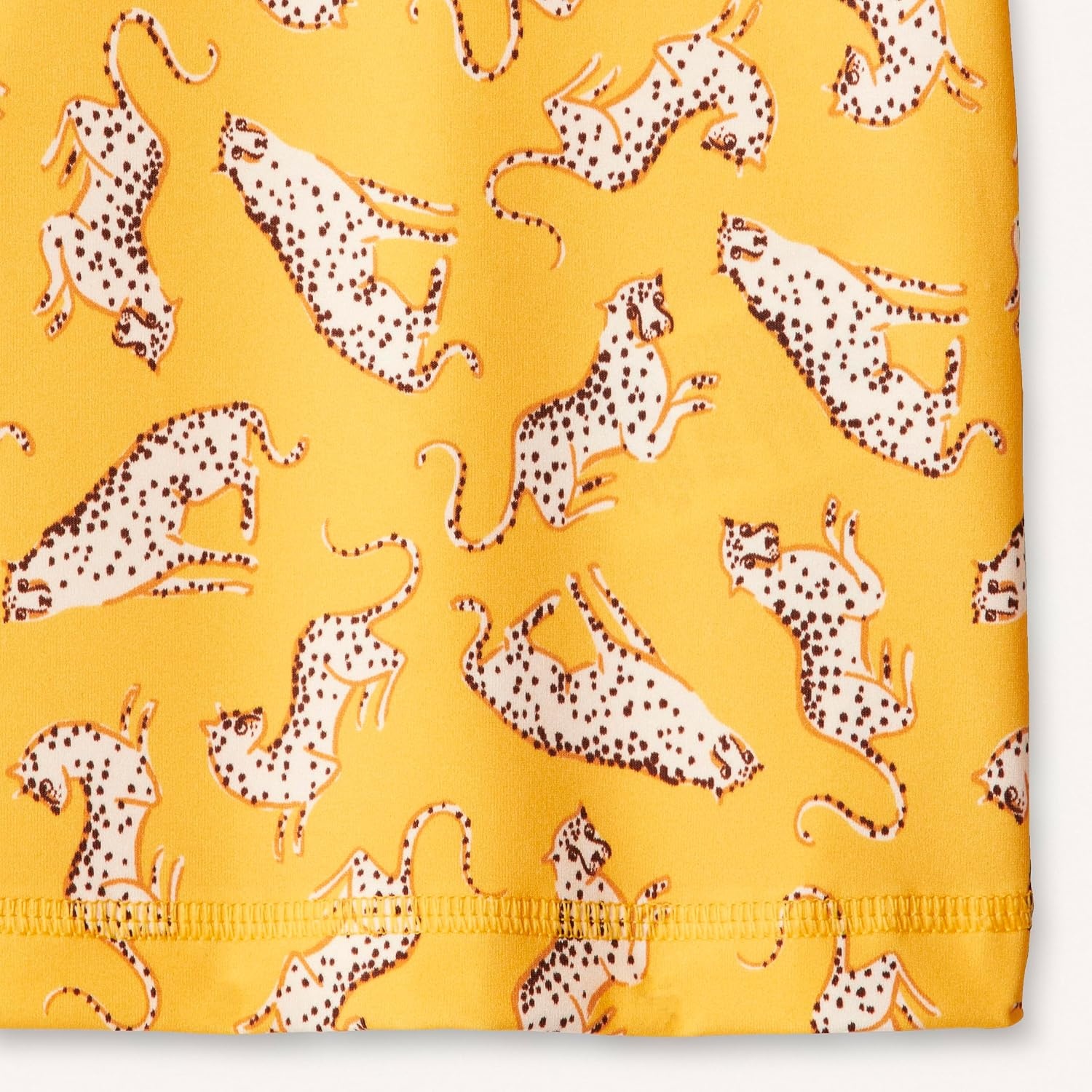 image:imageAmazon Essentials Girls and Toddlers Short Sleeve Slim Fit HighNeck Rashguard TShirtGolden Yellow Beige Leopard