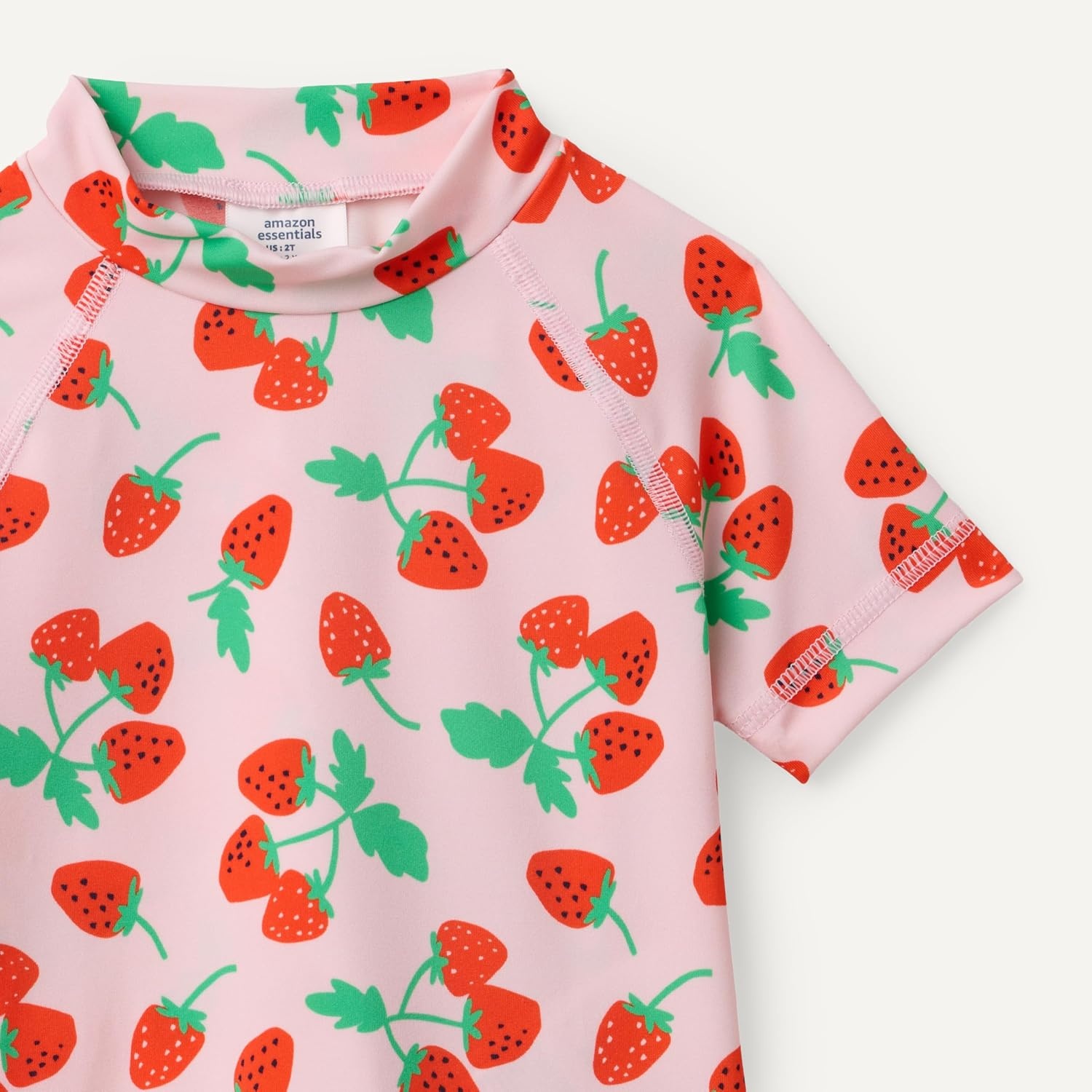 image:imageAmazon Essentials Girls and Toddlers Short Sleeve Slim Fit HighNeck Rashguard TShirtPink Tomato Red Strawberries
