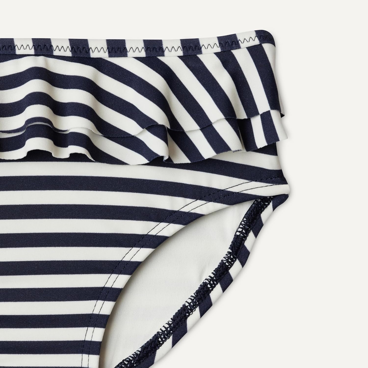 image:imageAmazon Essentials x Sofia Grainge Toddler and Baby Girls Two Piece Swimsuit with Crisscross Straps DoubleLayer FlounceIvory Navy Even Stripe