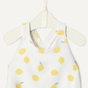 Amazon Essentials x Sofia Grainge Toddlers and Baby Girls’ One-Piece Swimsuit with Crisscross Straps, Ruffle Detail(Ivory Lemon)