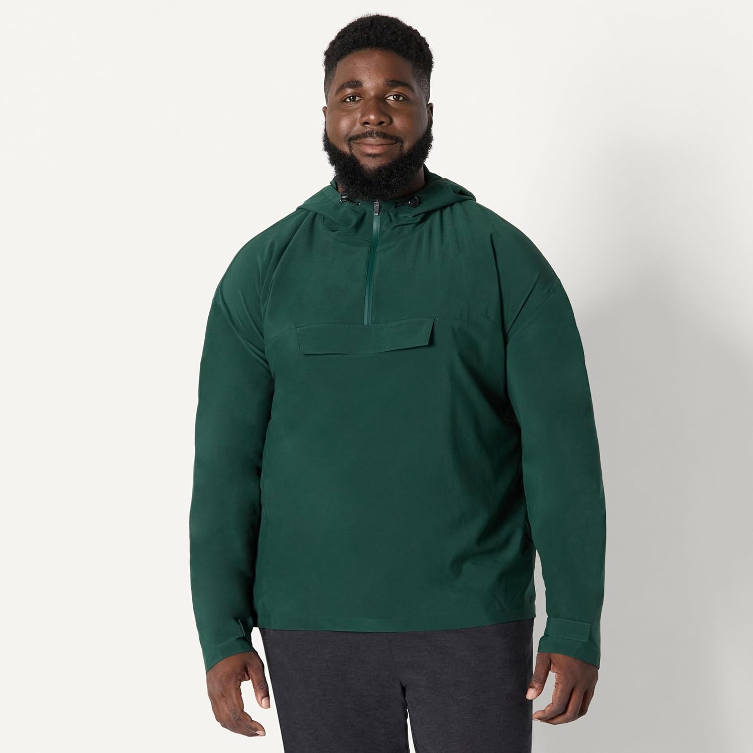 image:imageAmazon Essentials Mens Athletic Lightweight Stretch Woven Colorblock Anorak JacketDark Green