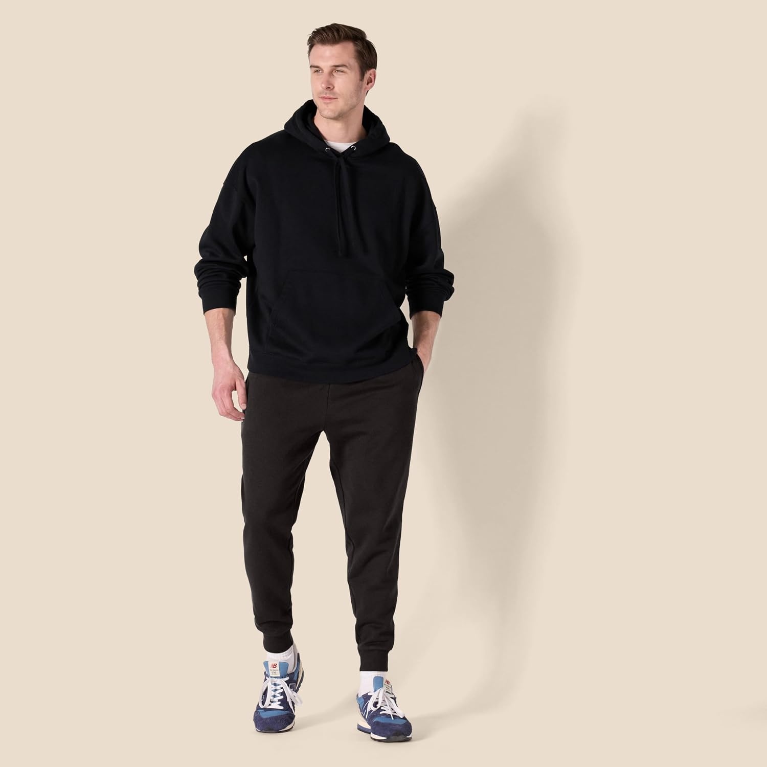 image:imageAmazon Essentials Mens Relaxed Fit Fleece Joggers Sweatpants Drawstring Waist Tapered Leg Ribbed Cuffs Brushed InteriorBlack