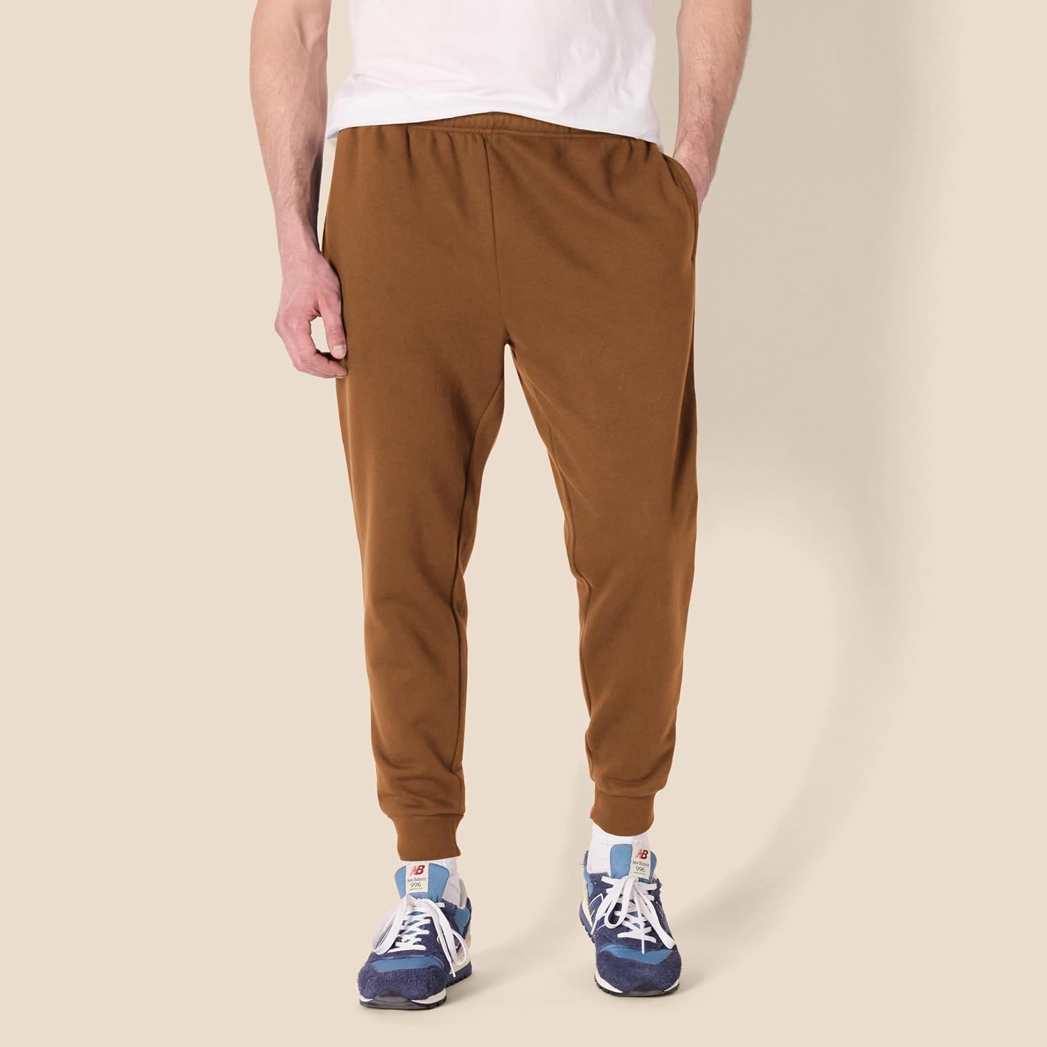 image:imageAmazon Essentials Mens Relaxed Fit Fleece Joggers Sweatpants Drawstring Waist Tapered Leg Ribbed Cuffs Brushed InteriorDark Tan