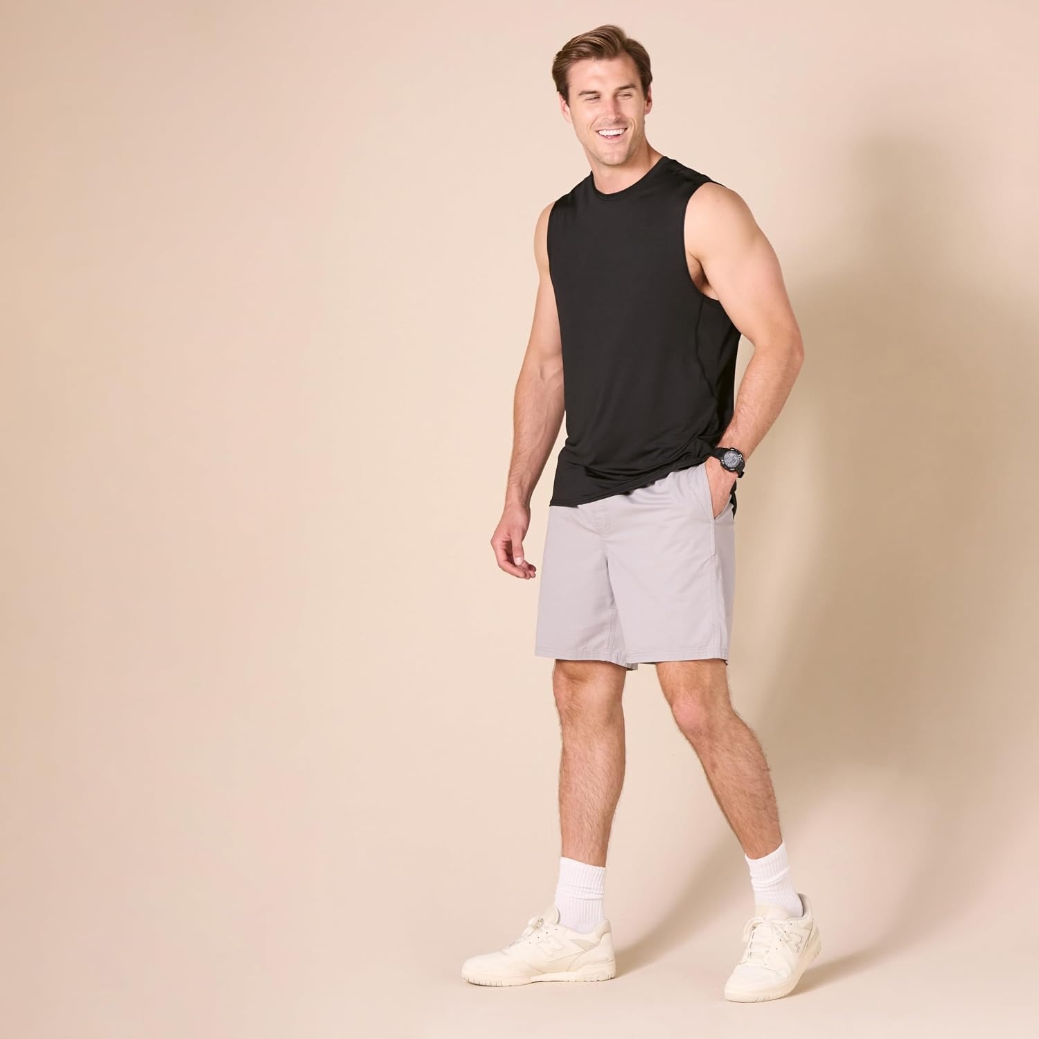 image:imageAmazon Essentials Mens Active Quick Dry MoistureWicking Tech Stretch Lightweight Sleeveless Muscle ShirtBlack Original