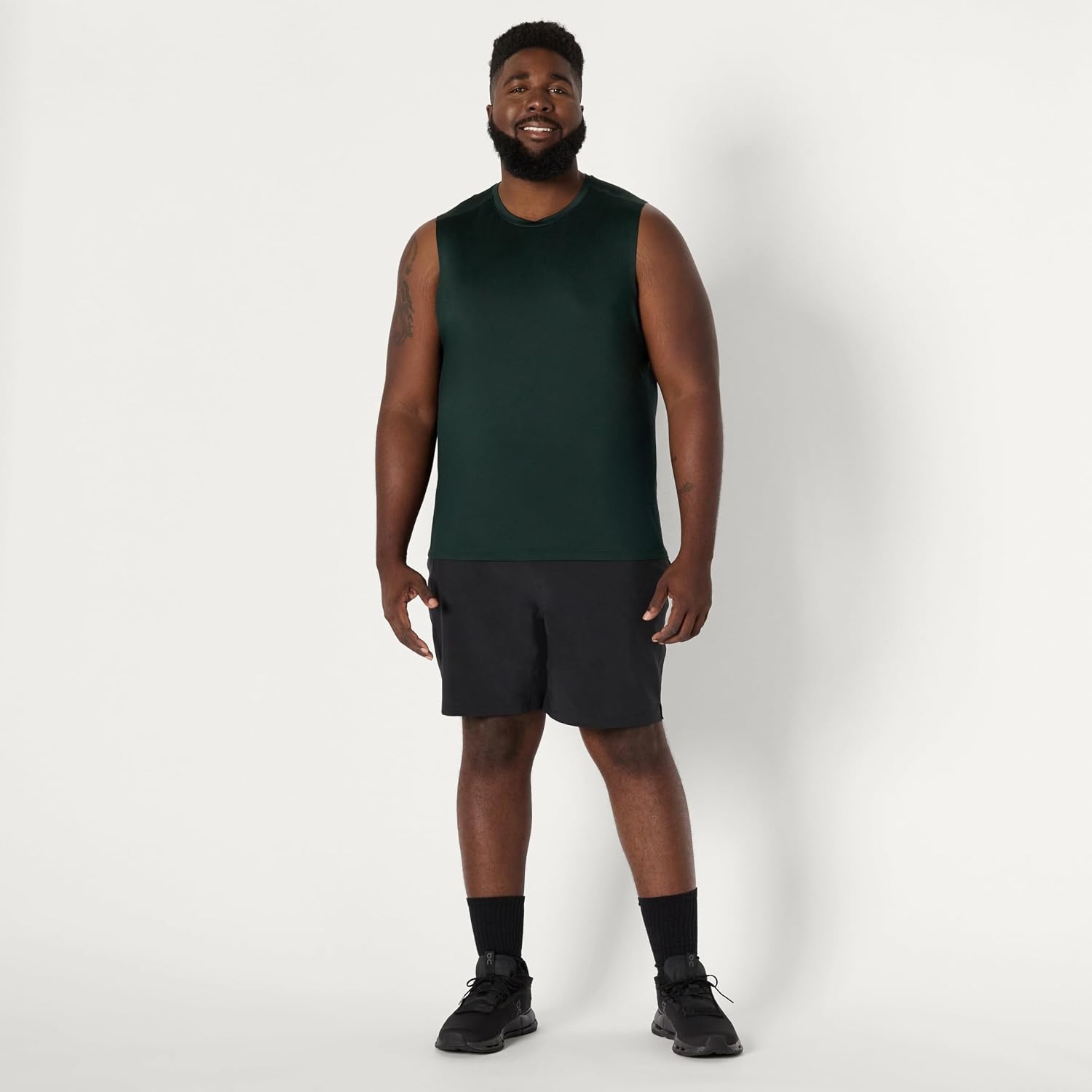 image:imageAmazon Essentials Mens Active Quick Dry MoistureWicking Tech Stretch Lightweight Sleeveless Muscle ShirtDark Green