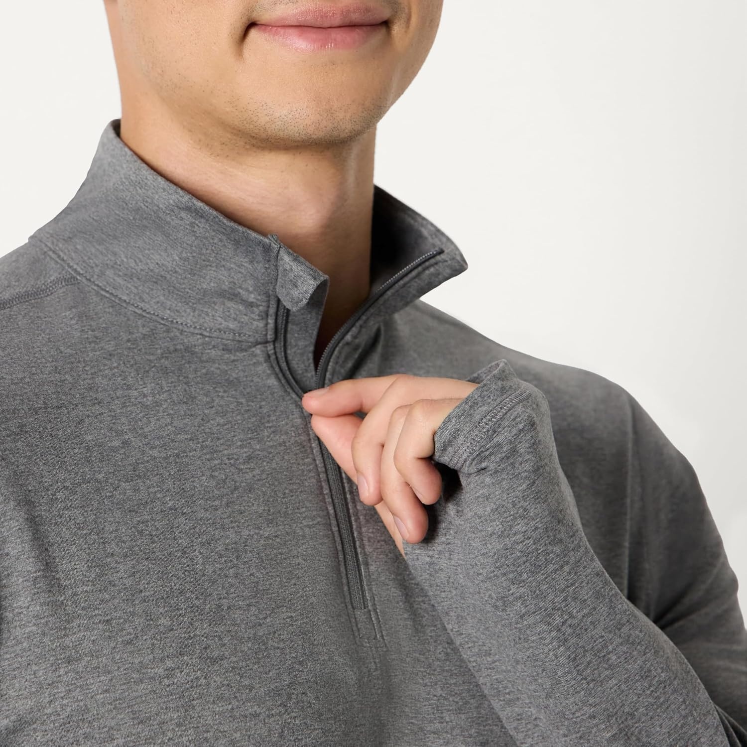 image:imageAmazon Essentials Mens Athletic Soft Performance Lightweight QuarterZip Running Long Sleeve Workout TopSpace Dye Grey