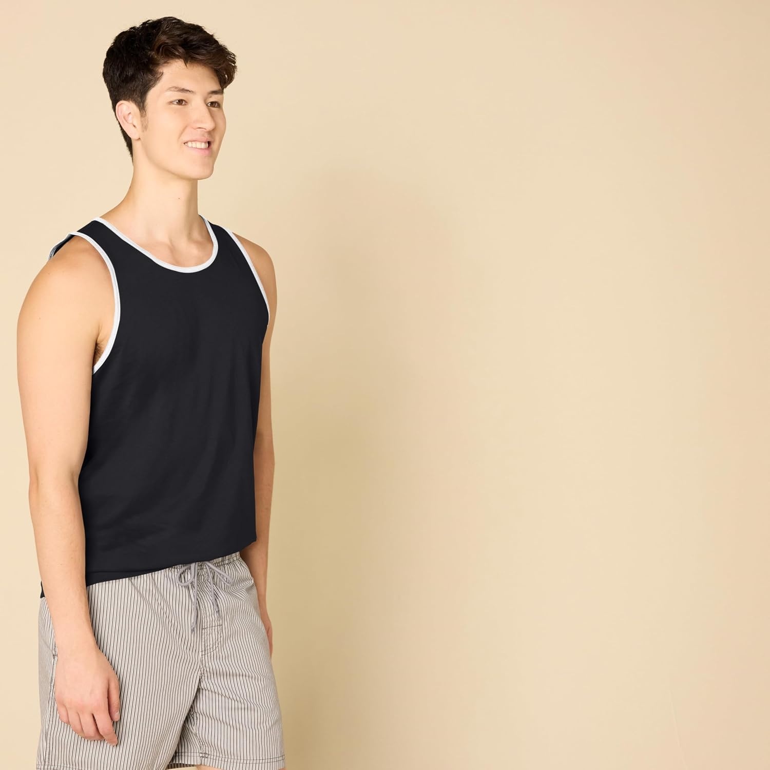 image:imageAmazon Essentials Mens RegularFit Sleeveless Tank TopsBlackWhite