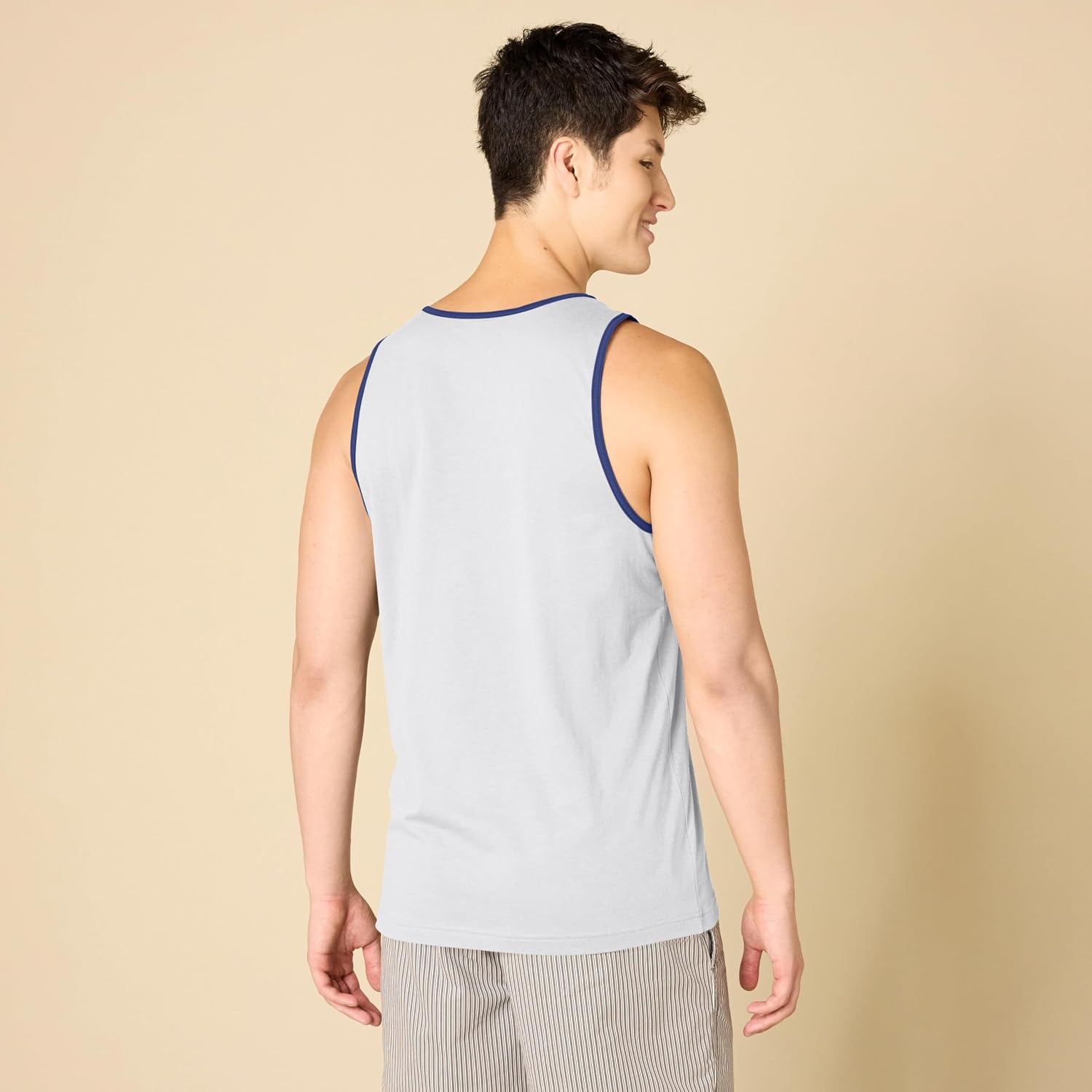 image:imageAmazon Essentials Mens RegularFit Sleeveless Tank TopsWhite