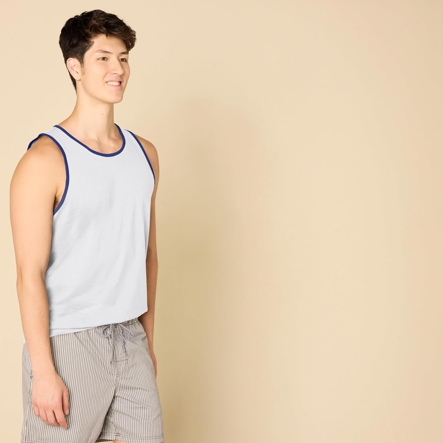 image:imageAmazon Essentials Mens RegularFit Sleeveless Tank TopsWhite