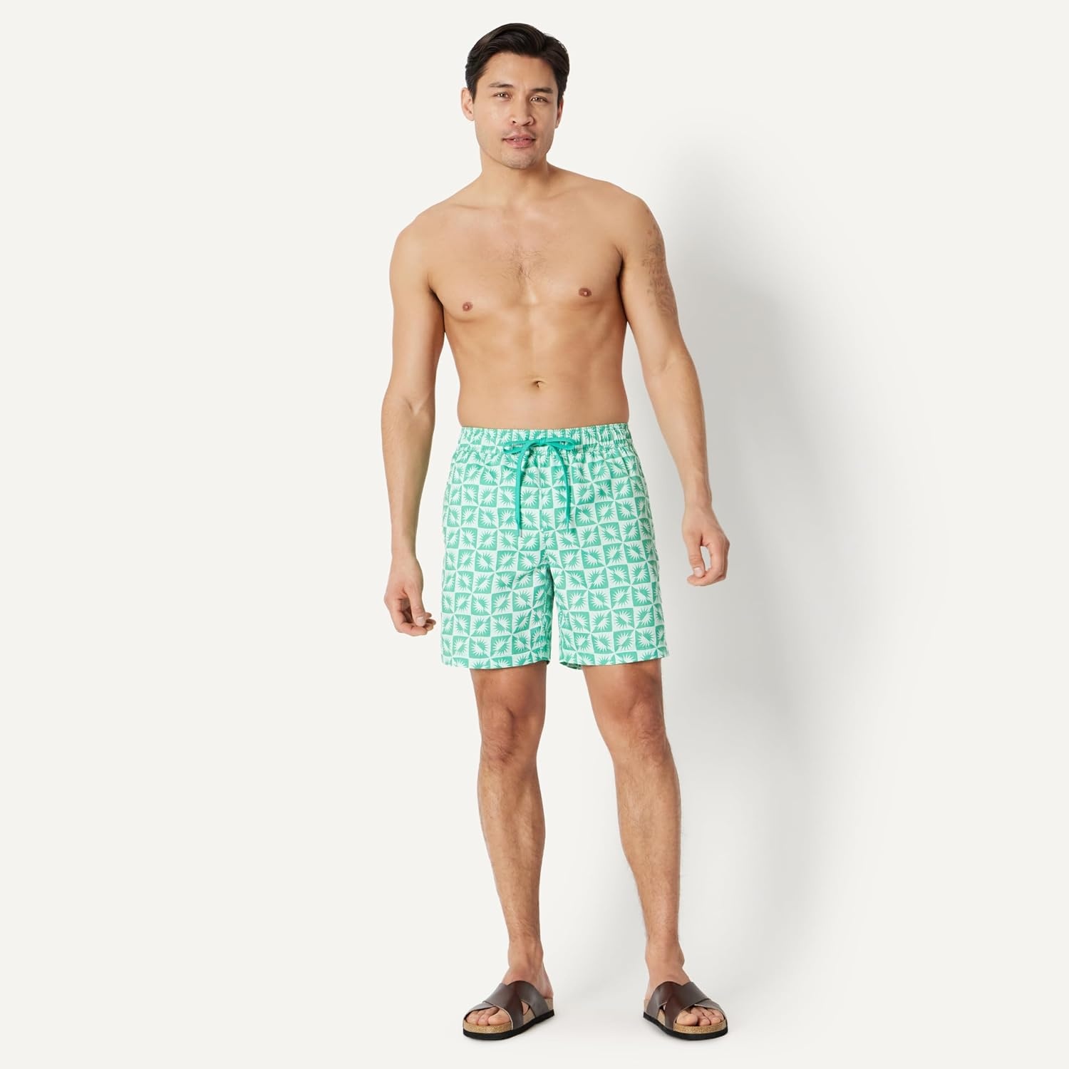 image:imageAmazon Essentials Mens Swim Trunks with Mesh Lining Pockets Drawstring ClosureLight Blue Mint Green Sun Geo