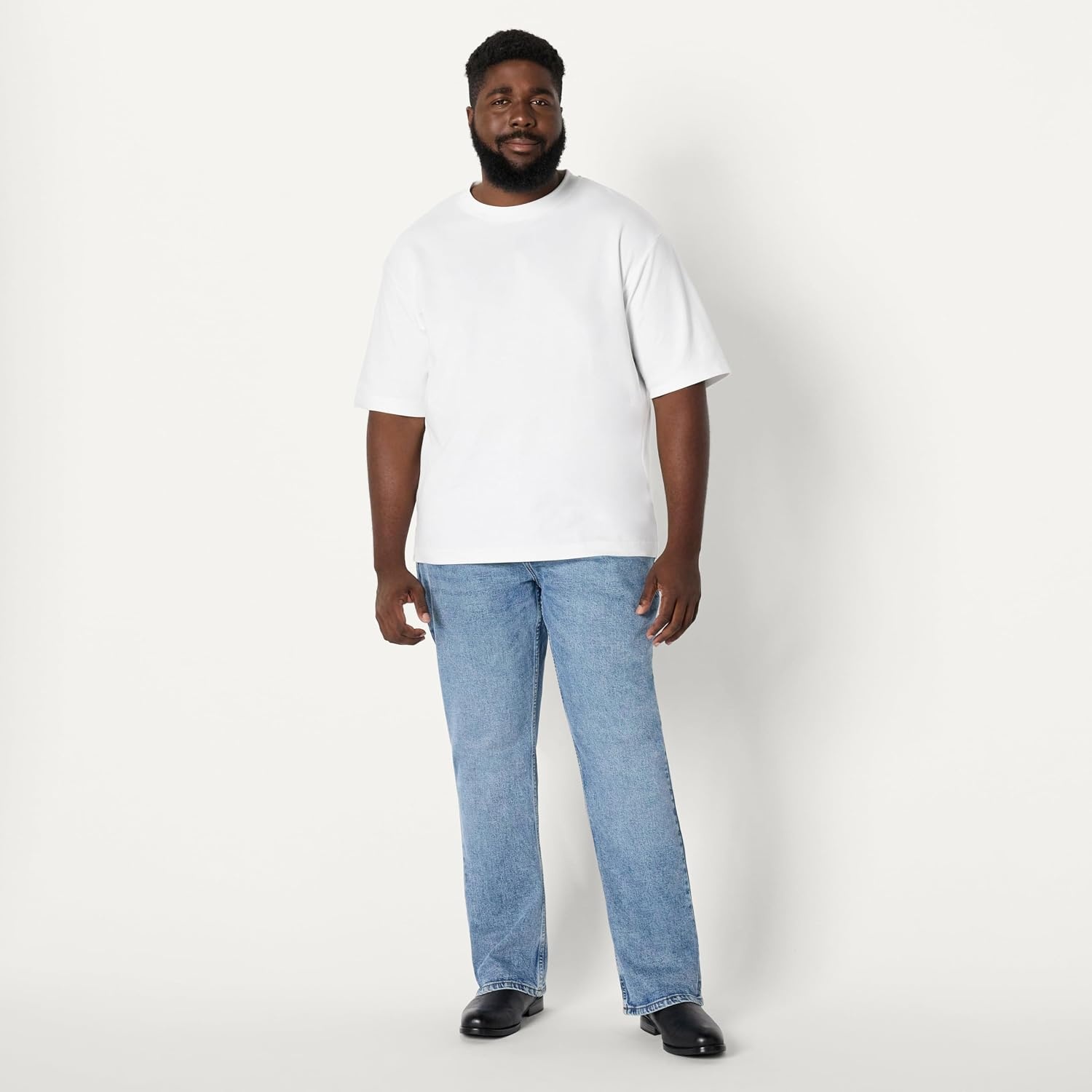 image:imageAmazon Essentials Mens Heavyweight Denim StraightFit Bootcut Jeans with 5 Pocket Styling Zip Fly StretchTinted Light Wash