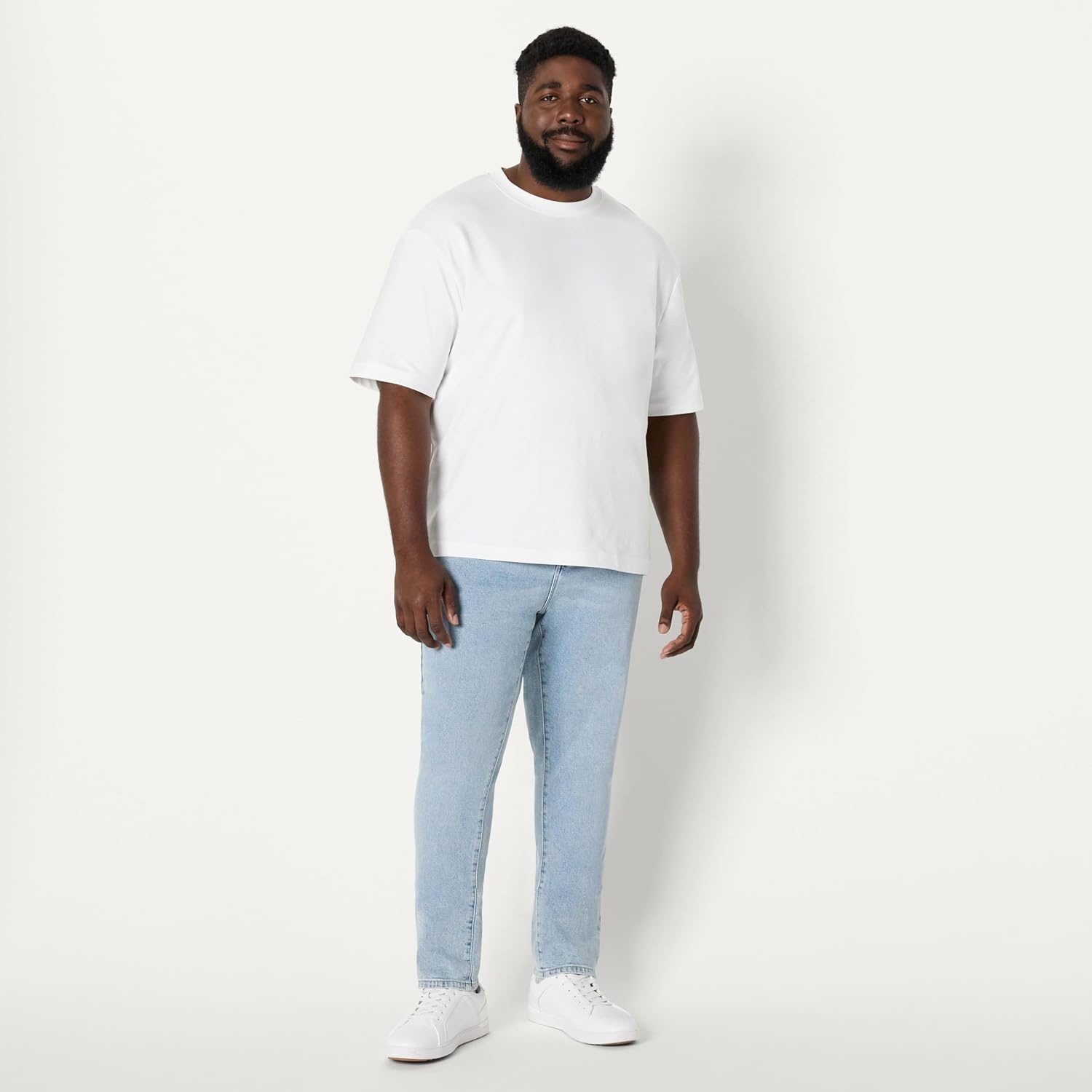 image:imageAmazon Essentials Mens Low Stretch SlimFit Jean Tapered Leg Vintage Inspired Midweight DenimIced Light Wash