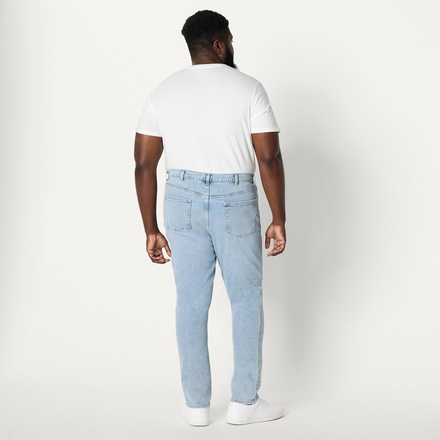image:imageAmazon Essentials Mens Low Stretch SlimFit Jean Tapered Leg Vintage Inspired Midweight DenimIced Light Wash