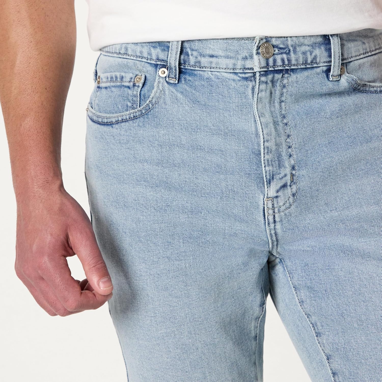 image:imageAmazon Essentials Mens Low Stretch SlimFit Jean Tapered Leg Vintage Inspired Midweight DenimIced Light Wash