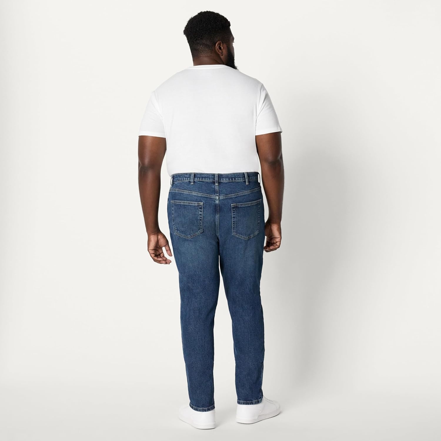 image:imageAmazon Essentials Mens Low Stretch SlimFit Jean Tapered Leg Vintage Inspired Midweight DenimTinted Medium Indigo