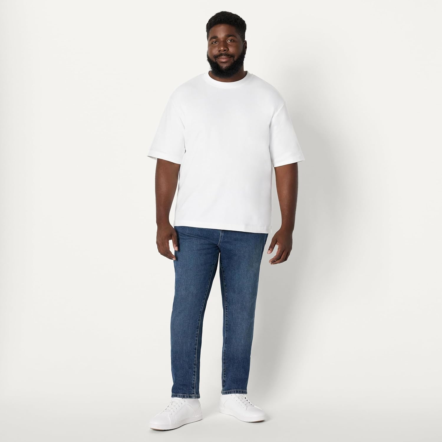 image:imageAmazon Essentials Mens Low Stretch SlimFit Jean Tapered Leg Vintage Inspired Midweight DenimTinted Medium Indigo