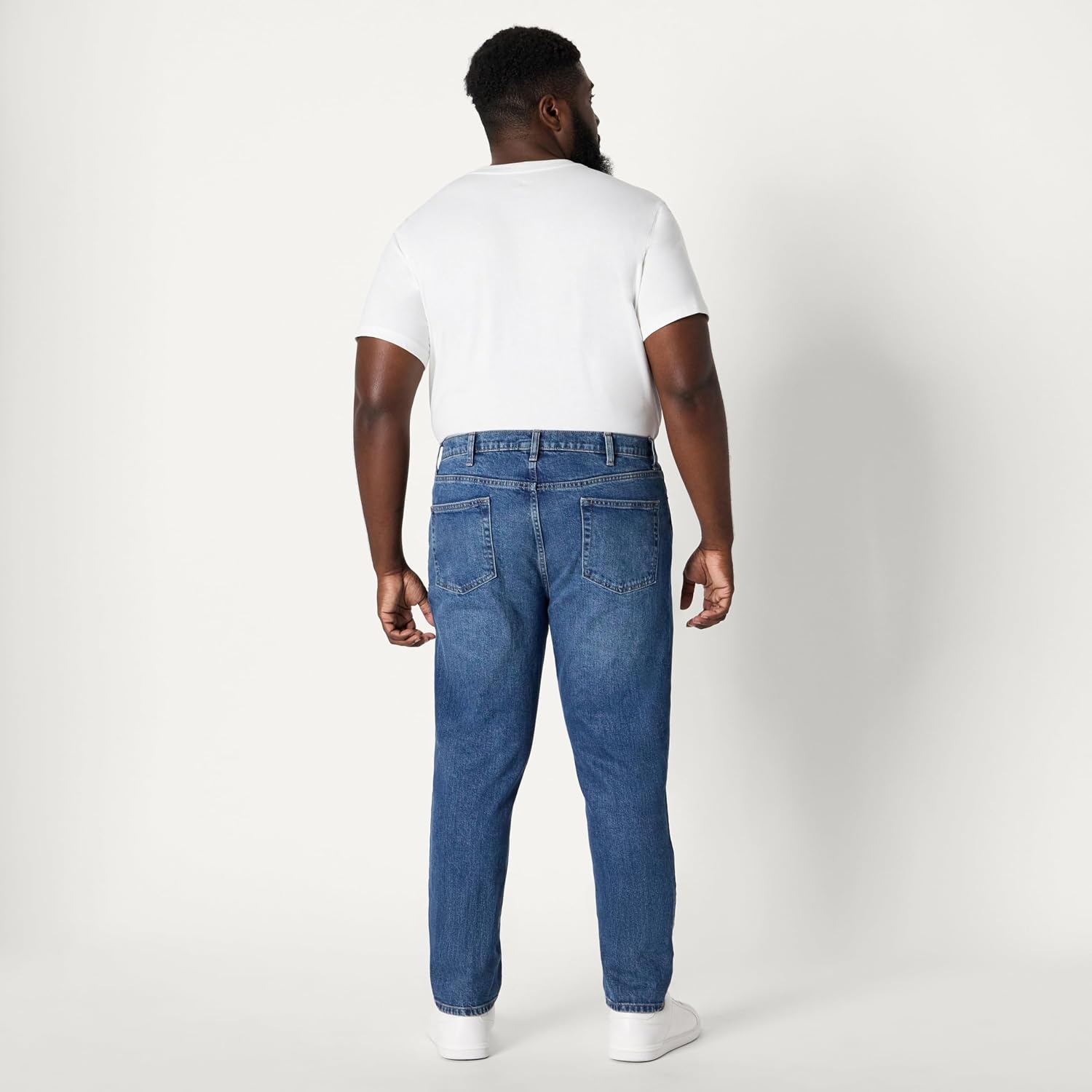 image:imageAmazon Essentials Mens SlimFit Jeans with Tapered Leg 5Pocket Styling Zip FlyStone Medium Wash