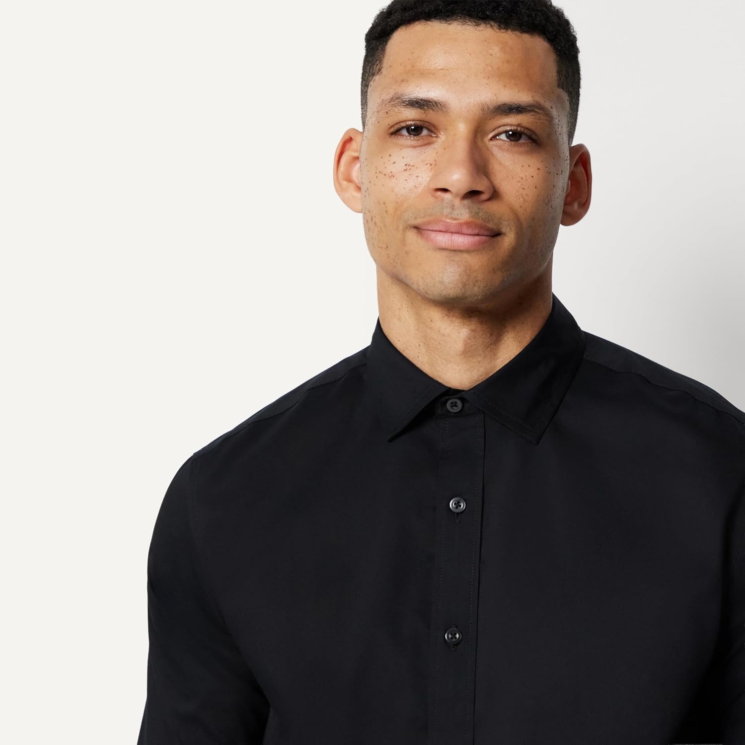 image:imageAmazon Essentials Mens Regular Fit Stretch Wrinkle Free Spread Collar Dress ShirtBlack