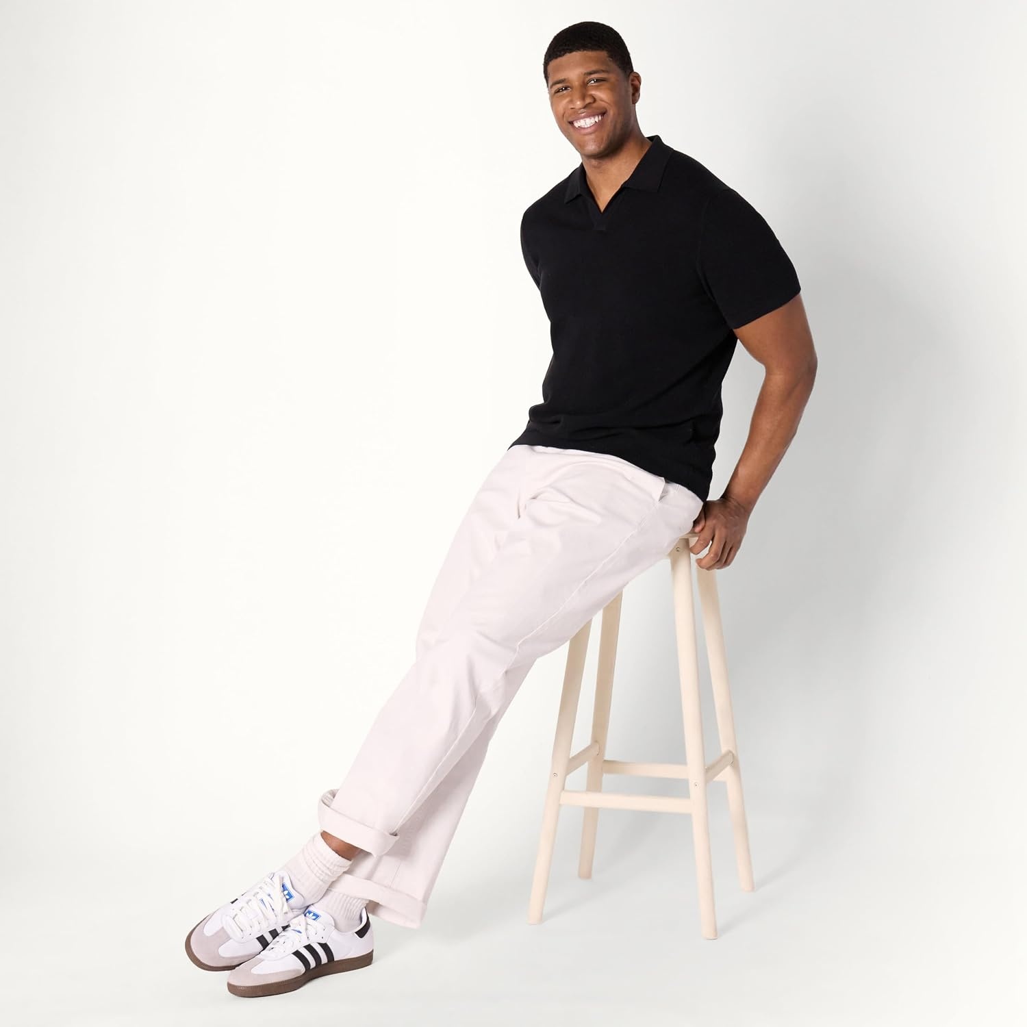 image:imageAmazon Essentials Mens RegularFit ShortSleeve Knit Polo Sweater Breathable Cotton NylonBlack