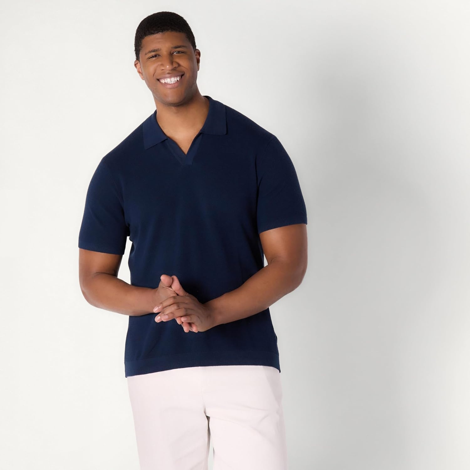 image:imageAmazon Essentials Mens RegularFit ShortSleeve Knit Polo Sweater Breathable Cotton NylonNavy