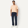 Amazon Essentials Men’s Regular Fit Golf Polo Shirt, Moisture-Wicking Quick Dry, Recycled Polyester, Short Sleeve(Pale Peach)