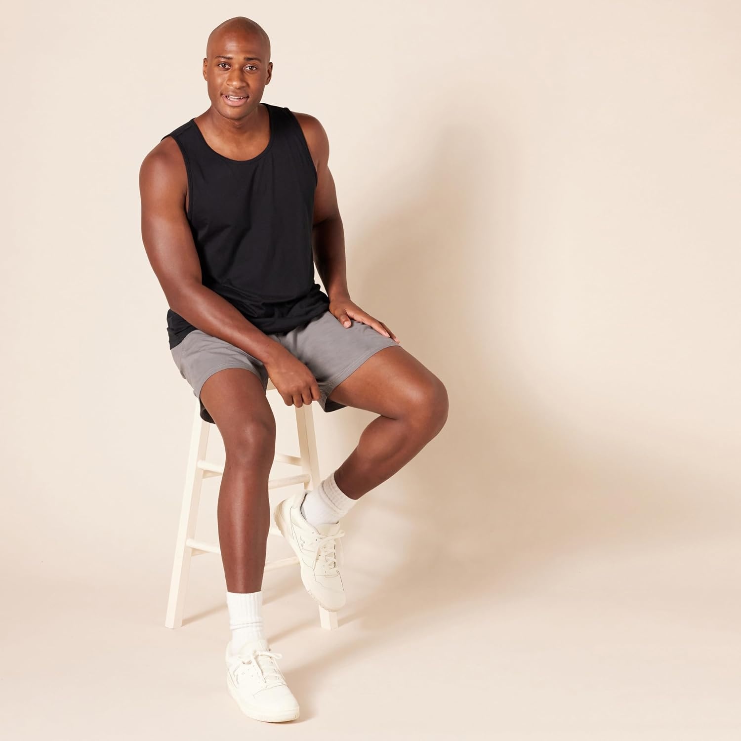 image:imageAmazon Essentials Mens Active Quick Dry Tech Stretch Moisture Wicking Lightweight Gym Tank TopBlack