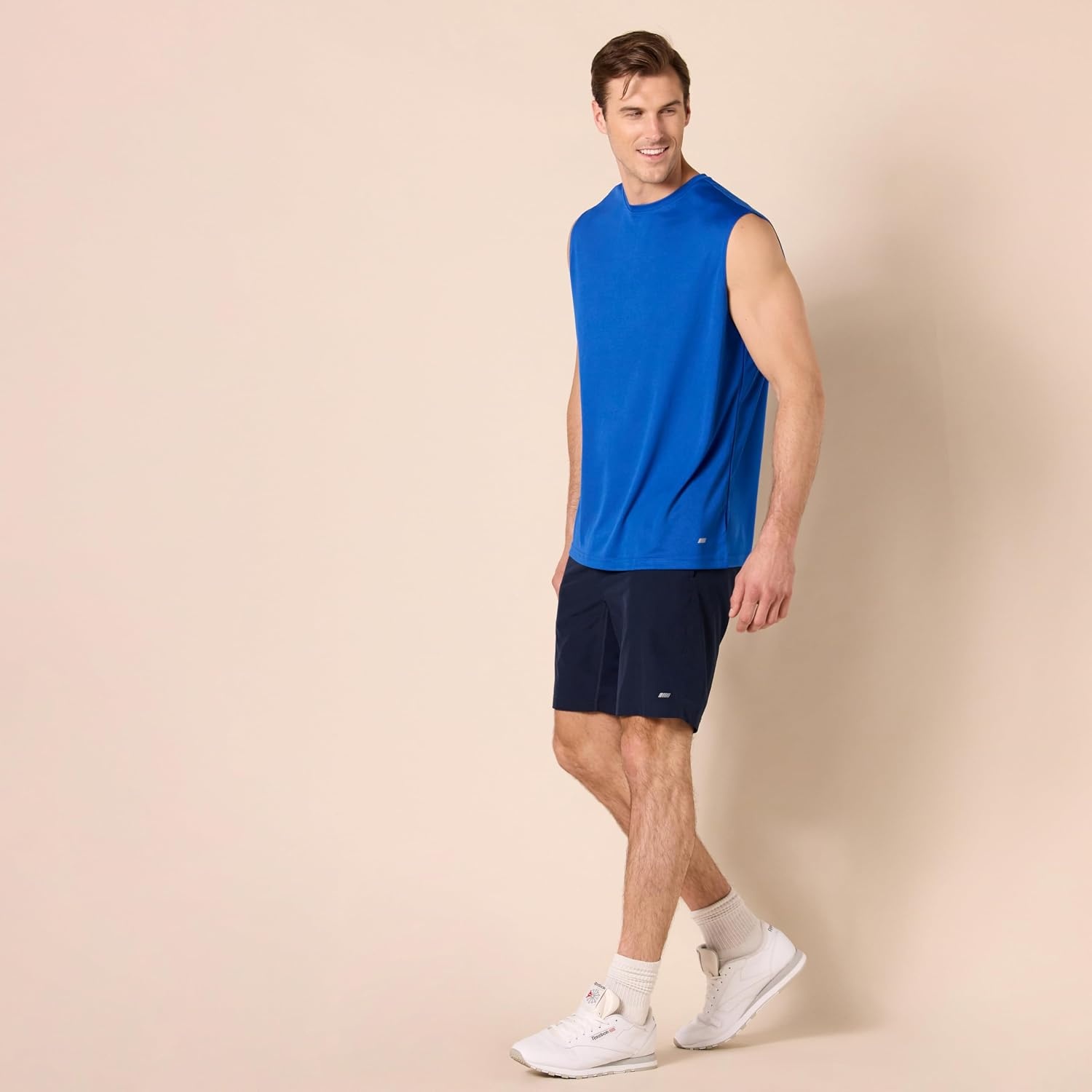 image:imageAmazon Essentials Mens Active Performance Tech Muscle Sleeveless Top Breathable Moisture Wicking Workout ShirtMedium GreyRoyal Blue