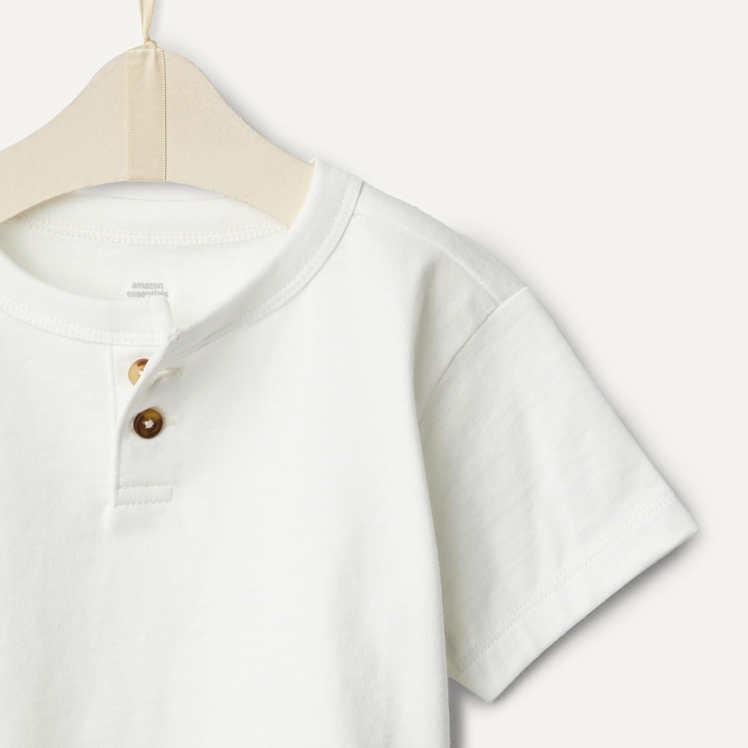 image:imageAmazon Essentials x Sofia Grainge Baby Boys Cotton Crewneck Short Sleeve TShirts with Shoulder SnapElephantsWhite