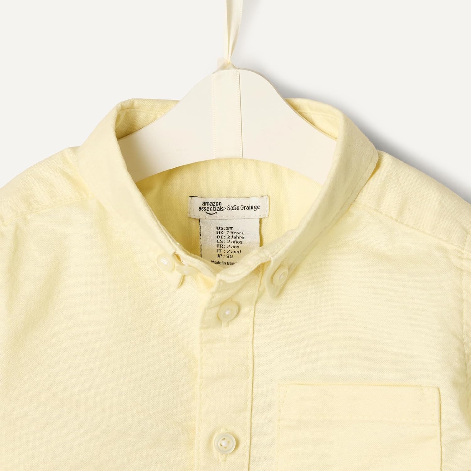 image:imageAmazon Essentials x Sofia Grainge Toddler and Baby Boys Stretch Oxford Band Collar Shirt with Patch PocketButter Yellow