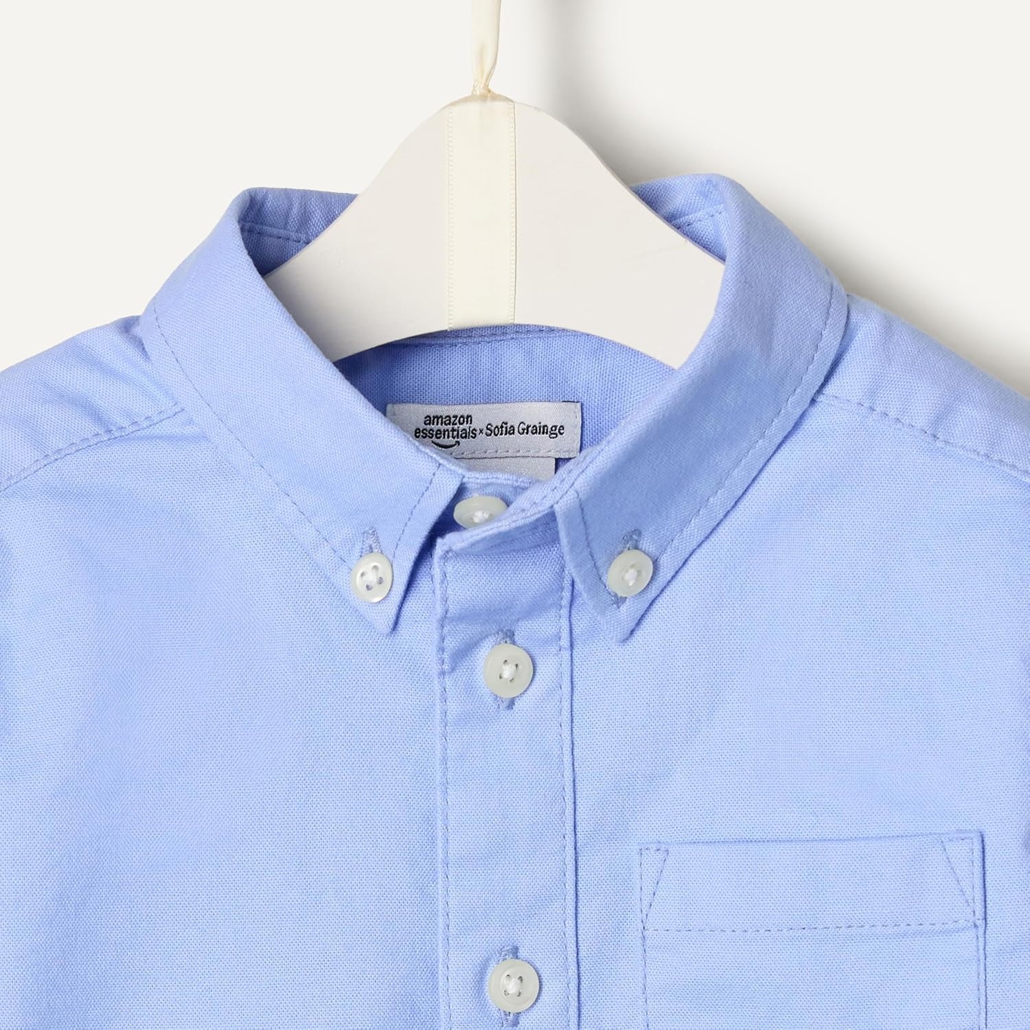 image:imageAmazon Essentials x Sofia Grainge Toddler and Baby Boys Stretch Oxford Band Collar Shirt with Patch PocketPowder Blue
