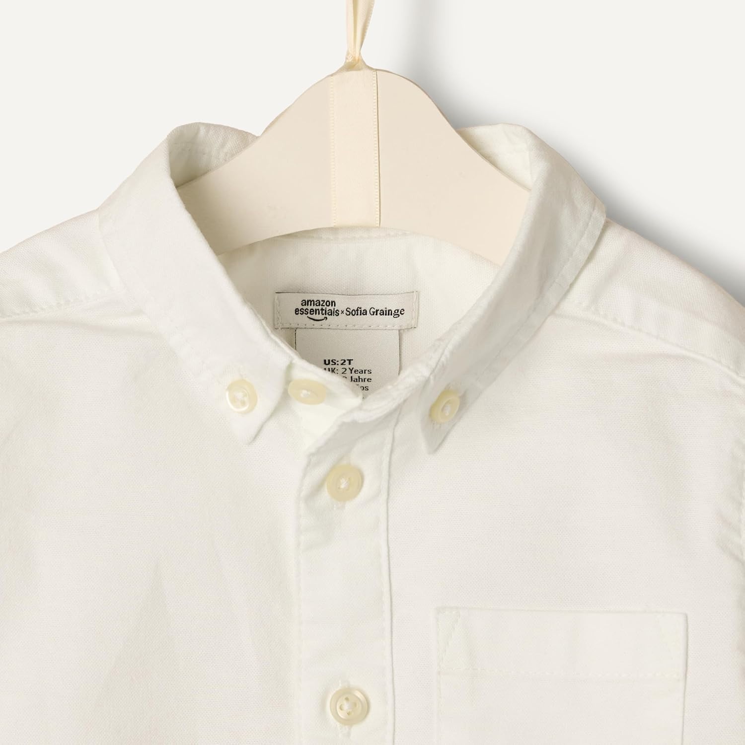 image:imageAmazon Essentials x Sofia Grainge Toddler and Baby Boys Stretch Oxford Band Collar Shirt with Patch PocketWhite
