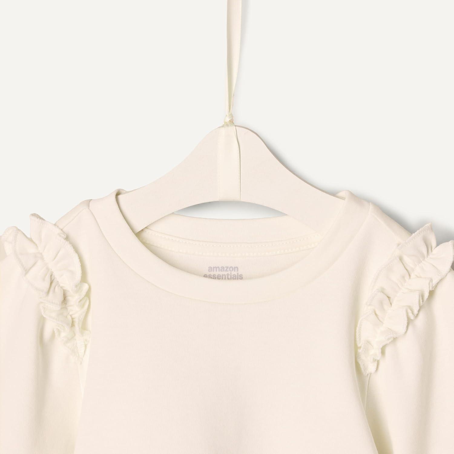 image:imageAmazon Essentials x Sofia Grainge Toddler and Baby Girls 34 Sleeve Knit TopIvorySketch Floral