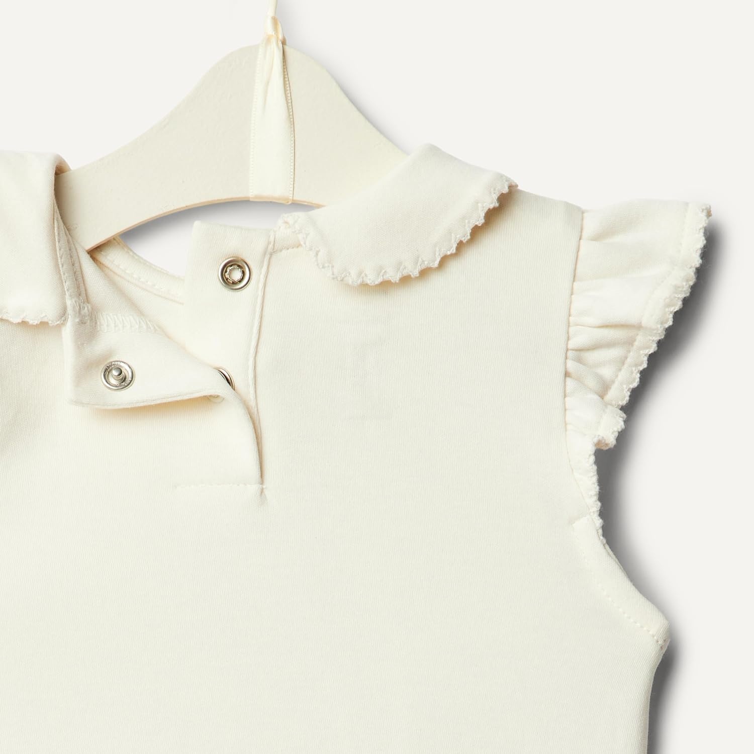 image:imageAmazon Essentials x Sofia Grainge Toddlers and Baby Girls Cotton Short Sleeve Blouses with Ruffles Pack of 2Ditsy FloralIvory