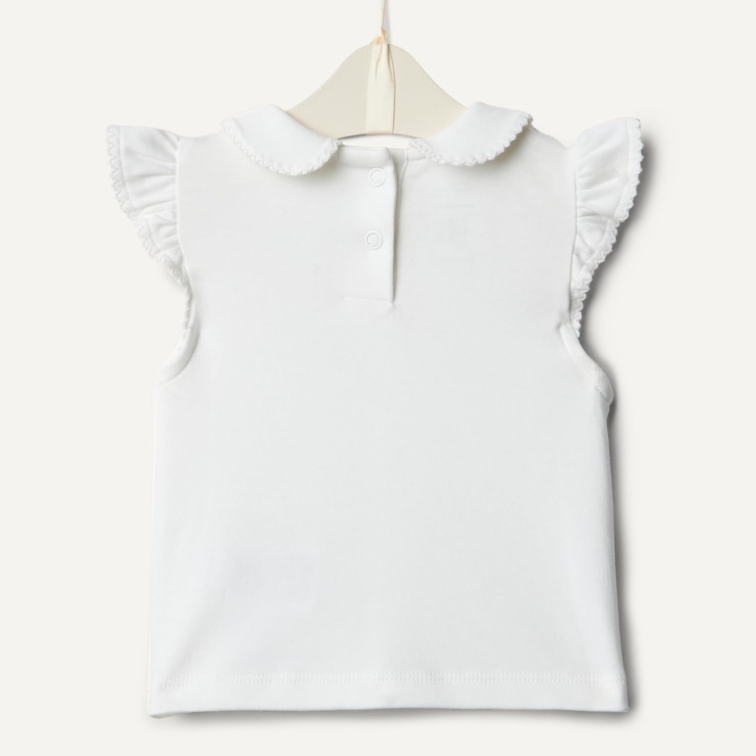 image:imageAmazon Essentials x Sofia Grainge Toddlers and Baby Girls Cotton Short Sleeve Blouses with Ruffles Pack of 2Light PinkWhite