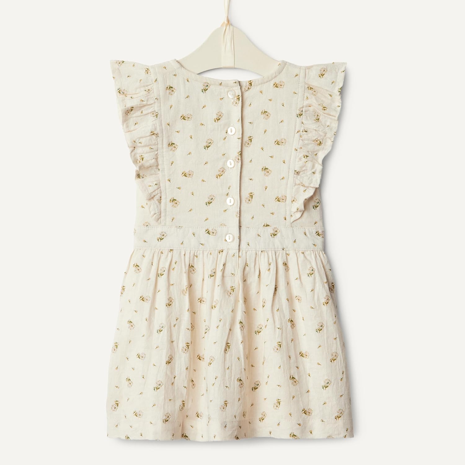 image:imageAmazon Essentials x Sofia Grainge Toddlers and Baby Girls Fit and Flare Linen Dress with Ruffle Flounce SleevesIvory Ditsy Flowers