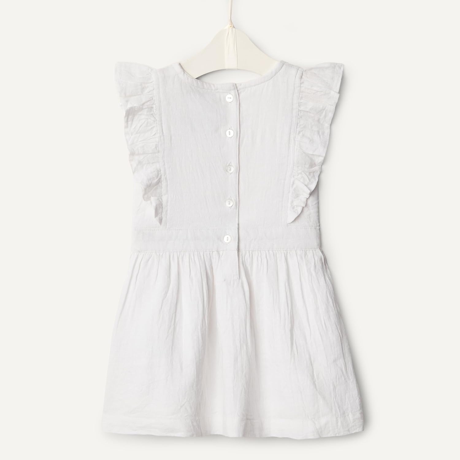 image:imageAmazon Essentials x Sofia Grainge Toddlers and Baby Girls Fit and Flare Linen Dress with Ruffle Flounce SleevesWhite