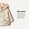 Amazon Essentials x Sofia Grainge Toddler and Baby Boys’ Water-Repellent Rain Jacket with Quilted Lining(Ivory Elephants)