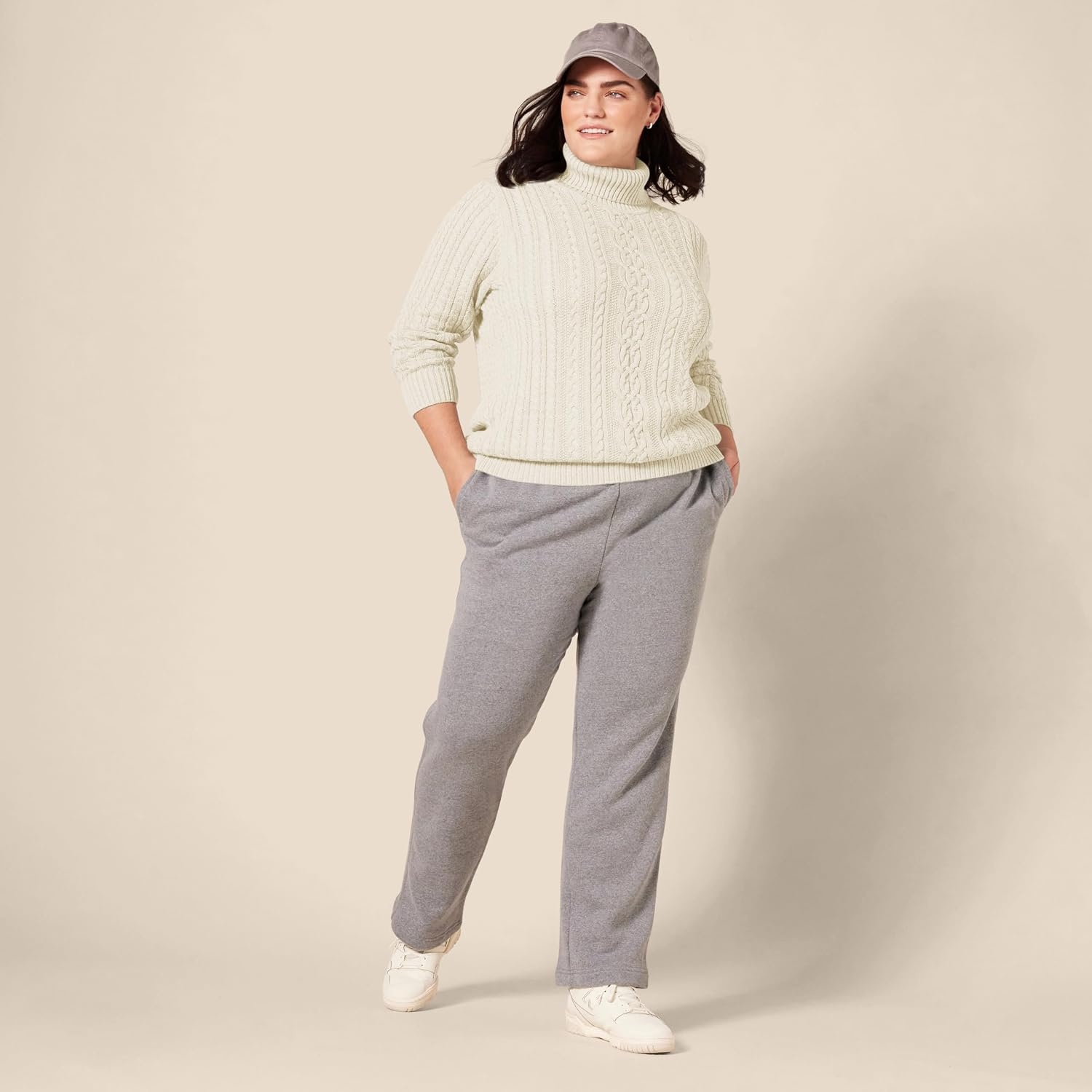 image:imageAmazon Essentials Womens Long Sleeve Fisherman Cable Knit Turtleneck Sweater Available in Plus SizeCream