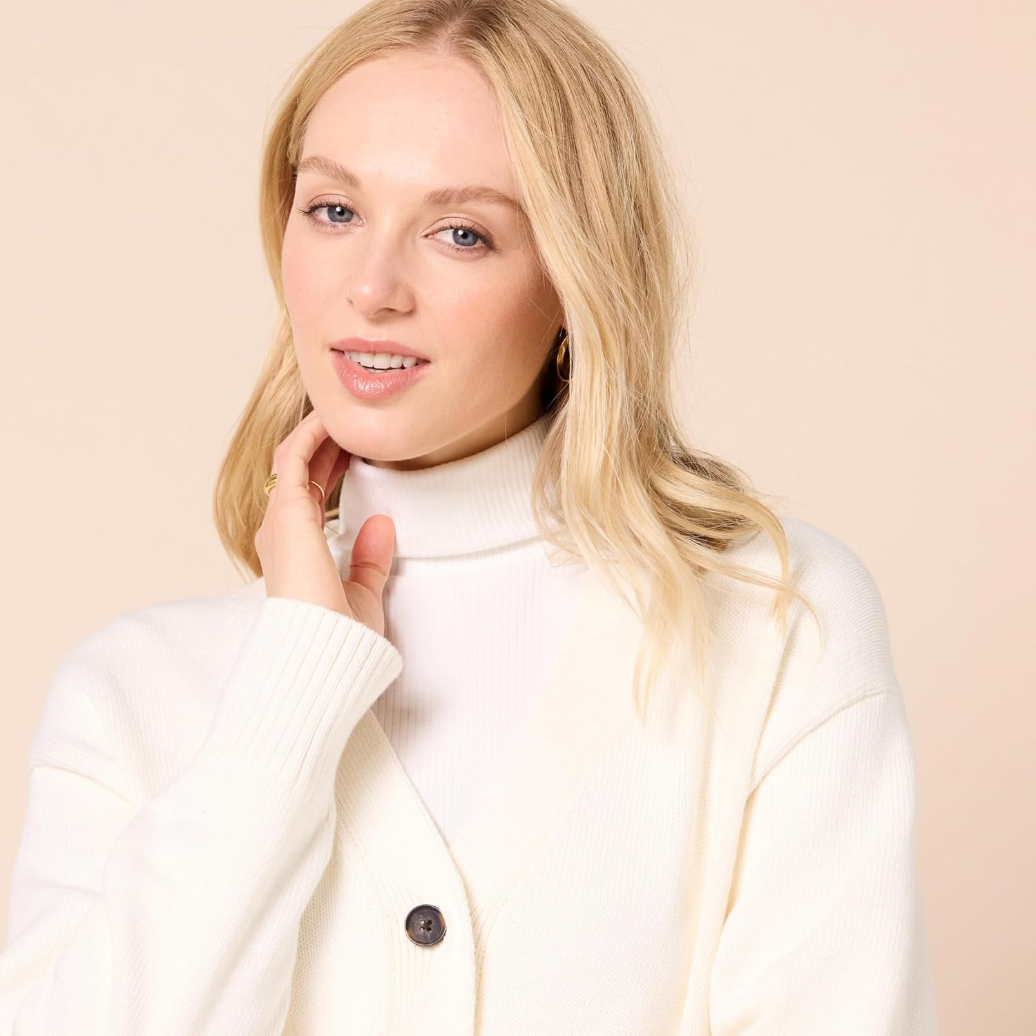 image:imageAmazon Essentials Womens Relaxed Fit Midweight Cardigan SweaterEggshell White