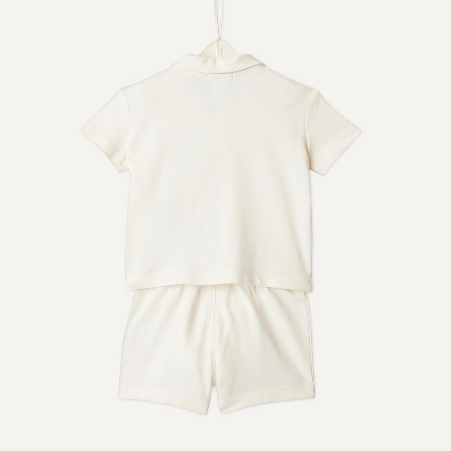 image:imageAmazon Essentials x Sofia Grainge Toddlers and Baby Boys Cotton Pique Short Sleeve Shirt amp Shorts Play SetIvory Navy Petit Soleil